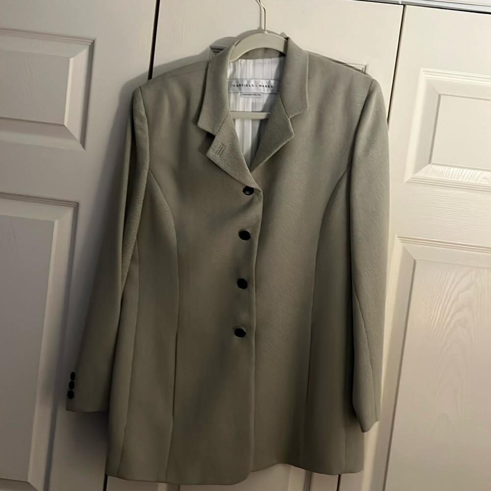 Garfield and Marks size 12 sport jacket. Elongated style. Stain on back.